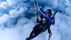 People paragliding