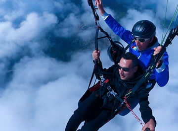 People paragliding