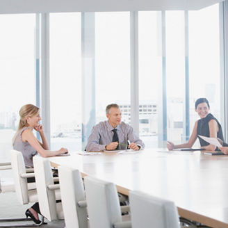 Businesspeople having meeting in conference room