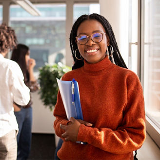Young female professional smiling at camera