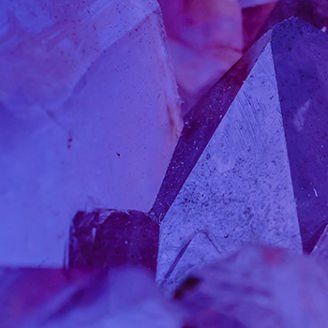 Crystals with purple blue veil
