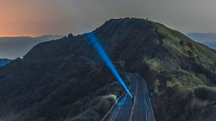 Scenic View Of Mountains Against Sky At Night