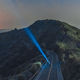 Scenic View Of Mountains Against Sky At Night