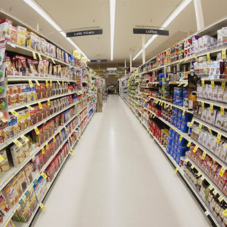 An aisle of a grocery store, diminishing perspective