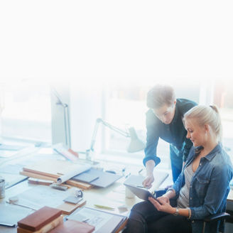 two colleauges discussing contract