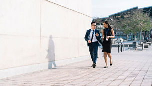 Two colleagues are walking