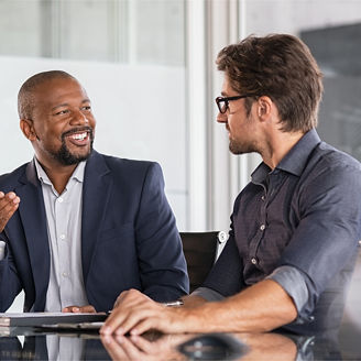 Two colleagues discussing SAP