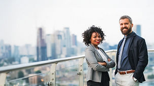  Two Colleagues with Sky View