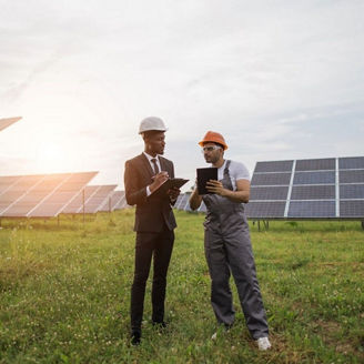 Two collegues inspecting solar energy site