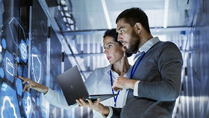 Man and woman in a server room