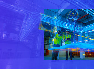 Two workers in factory