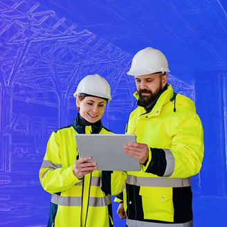 Two workers looking at tablet