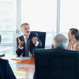 Business people meeting at table in conference room