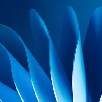 Man in blue suit talking on phone