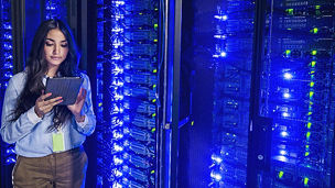 Person standing in a server room