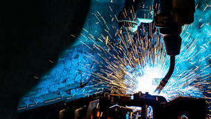 Welding robots movement in a car factory