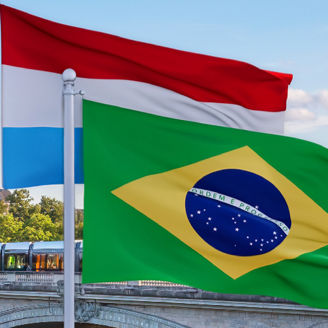 Braziian flag and luxemboug flag in front of Luxembourg