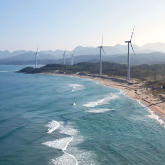 windmills on the shore