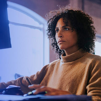 Woman behind computer
