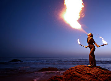 Woman breathing fire