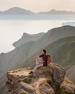 Woman hiking on lakefront