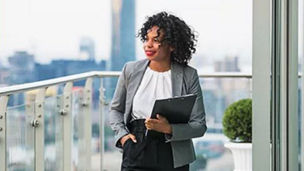 Woman Holding Laptop Banner