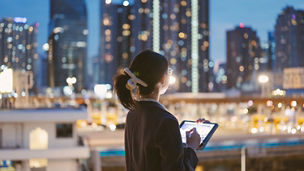 woman holding tablet
