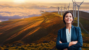 Woman in formals against mountains windmills