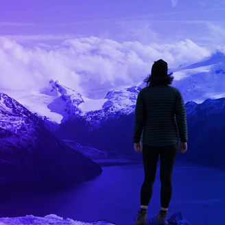 woman looking at the mountains