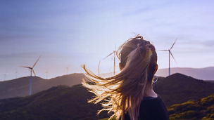 Woman-looking-at-Windmill