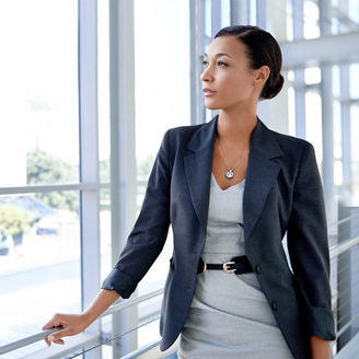 Woman looking outside window