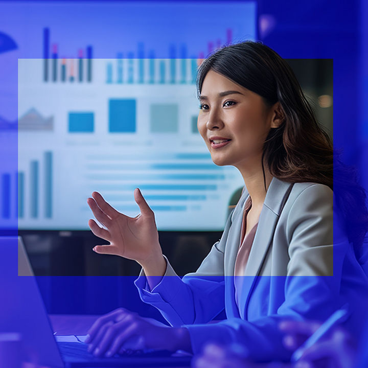 Woman on a laptop in meeting
