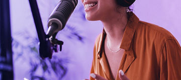 woman recording podcast