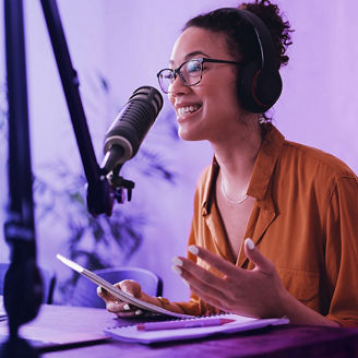 woman recording podcast