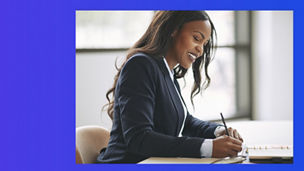 Woman sitting and writing