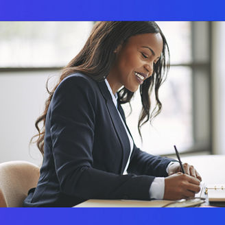 Woman sitting and writing
