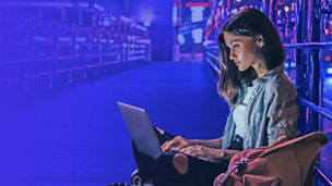 Woman behind her laptop