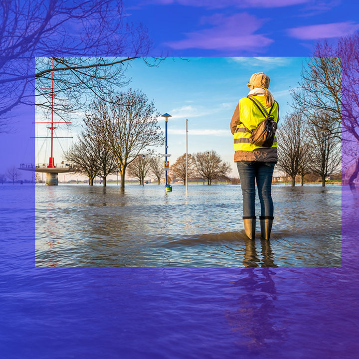 Woman standing in flooded park banner