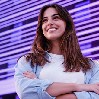 Woman standing in front of the building
