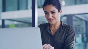Business woman using laptop