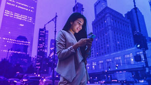 Woman using phone on street overlay