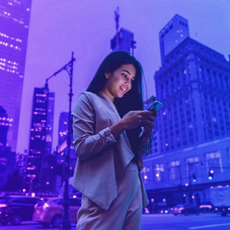 Woman using phone on street overlay