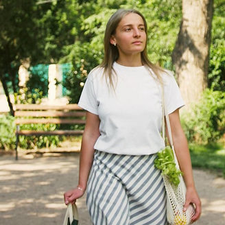 Woman walking with bags in her hand