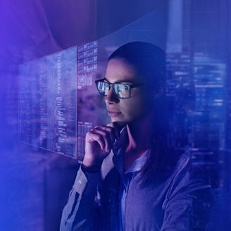 woman with glasses looking at holographic data display banner
