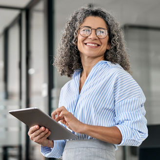 Woman with tablet smiling