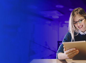 Woman with glasses using tablet banner