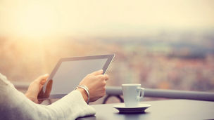 Woman using digital tablet and drink coffee 26