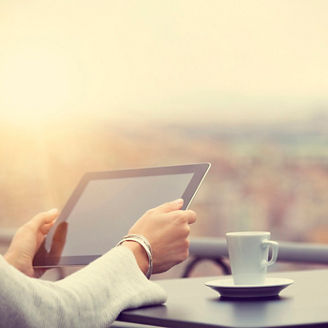 Woman using digital tablet and drink coffee 26
