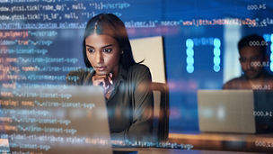 Laptop, code hologram and woman thinking of data analytics, information technology or software overlay at night. Computer and IT people solution with algorithm, statistics and cybersecurity research