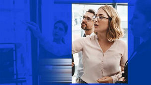 Woman writing on a white board